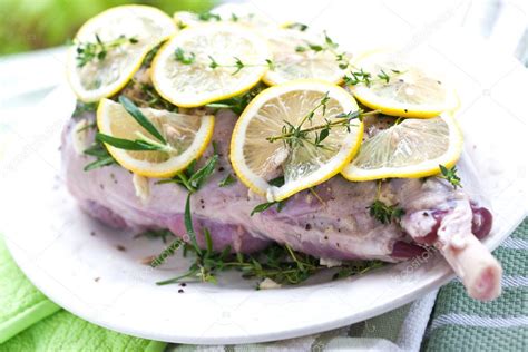 Leg of lamb with rosemary, garlic and lemon ready for the oven Stock ...