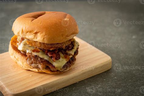 pork burger with cheese, bacon and onion rings 7669836 Stock Photo at ...