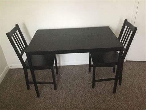 Ikea Tarendo dining table with two Stefan chairs | in Chelmsford, Essex | Gumtree