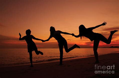 Silhouette Of Friends In Sunset Photograph by Suwit Ritjaroon - Fine Art America