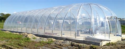 Biodome greenhouse completed with ETFE pneumatic pillow covering; includes automated energy ...