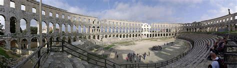 Historyfilia (Restored arched walls of the Roman Amphitheater at...)