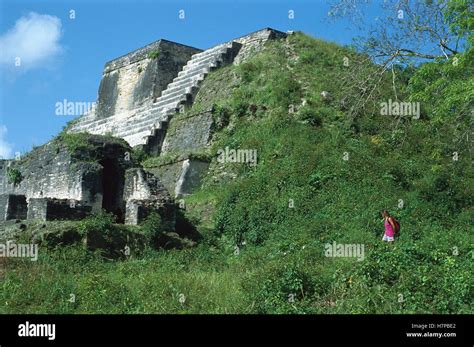 Tourist at Altun Ha Mayan ruins, Belize Stock Photo - Alamy