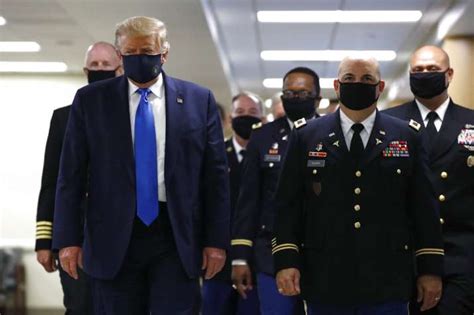 US President Donald trump wears mask for first time in public photos ...