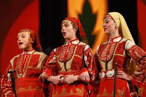 People in Traditional Folklore Costumes Perform Folk Dance Bulgarian ...