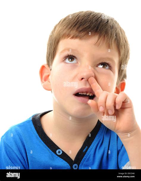 Boy picking his nose, young child picking their nose Stock Photo - Alamy