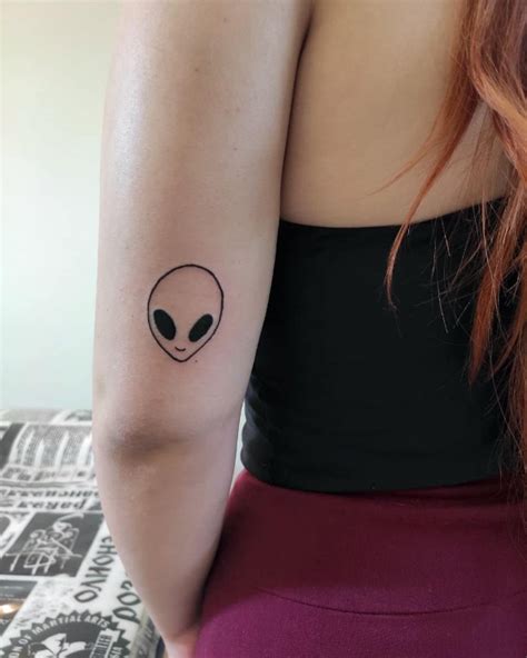 Stunning Alien Face Tattoo Design