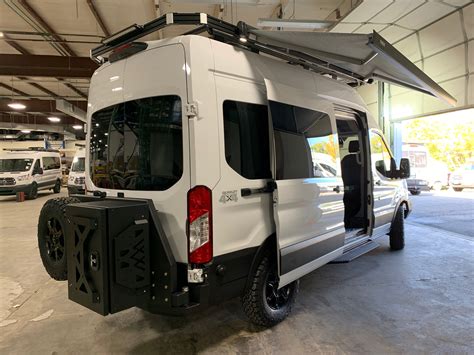 Ford Transit VanDOit Camper Van with BackwoodBumper and Thule Awning | Ford transit, Van for ...