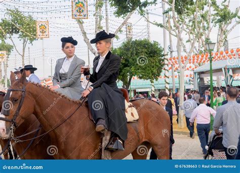 Two Amazons Wearing Traditional Andalusian Uniforms at the April S Fair of Seville Editorial ...