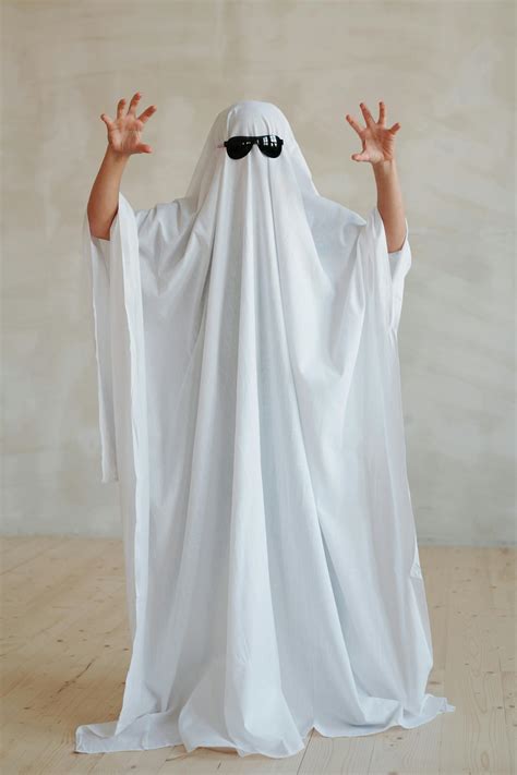 Person Wearing White Halloween Costume and Sunglasses · Free Stock Photo