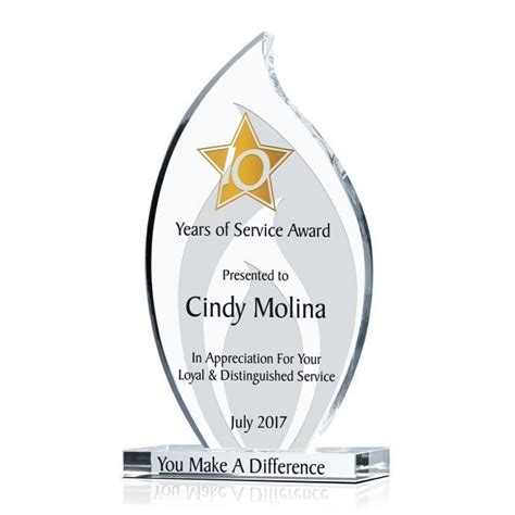 With years of service highlighted with the gold star, the Flame Employee Long Service Award ...