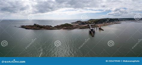 View of the Mumbles Headland with the Historic Lighthouse and Piers in Swansea Bay Stock Photo ...