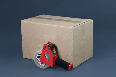Small Cardboard Moving Box with a Roll of Tape Next to it | Flickr