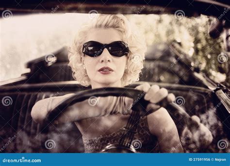 Retro Woman Driving A Car Royalty Free Stock Image - Image: 27591956