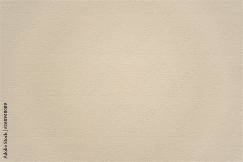 Abstract beige paper texture background or backdrop. Empty clean note page or parchment sheet ...