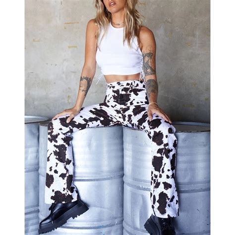 Motel Rocks | Pants & Jumpsuits | Motel Cow Print Zoven Flares | Poshmark