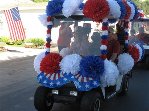 4th of July Golf Cart Parade decorated with Tissue Paper Pom Poms ...