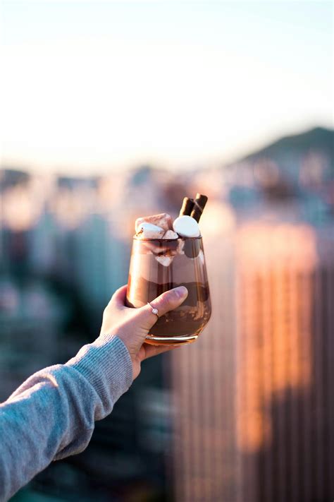 Person Holding Coffee Filled Mug · Free Stock Photo