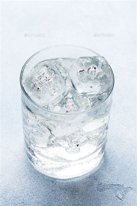 Glass of water with ice cubes in 2024 | Glass, Ice cube, Cube