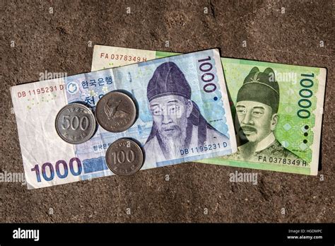 South Korean won bank notes and coins Stock Photo - Alamy