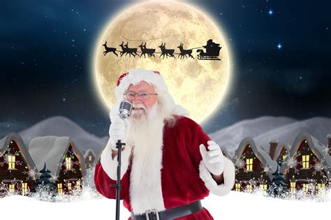 Santa claus singing christmas song in microphone - DNG Online Limited