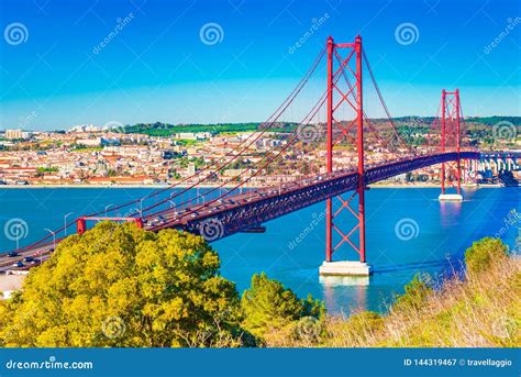 The 25th April Bridge Ponte 25 De Abril in Lisbon, Portugal. View from Almada Stock Image ...