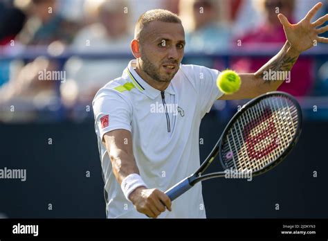 Eastbourne, England, 21 June, 2022. Tennis player, Daniel Evans playing single handed forehand ...