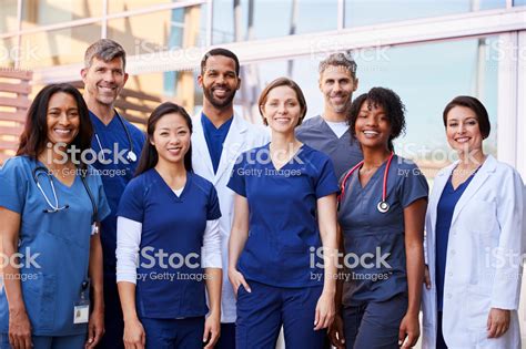 Smiling medical team standing together outside a hospital | SEHC School