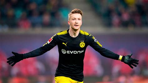 Marco Reus signs new five-and-a-half-year deal to stay at Borussia Dortmund until 2023 ...