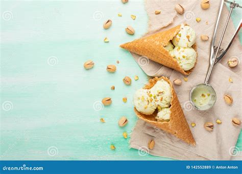 Pistachio Ice Cream with Pistachio Nuts and Ice Cream Spoon, Top View, Flat Lay.Summer Mood ...