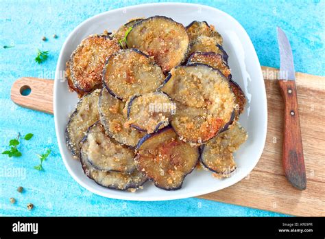 Fried eggplant chips Stock Photo - Alamy