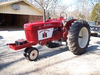 1945 Farmall M Pulling Tractor - TractorShed.com