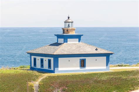 Premium Photo | Beautiful Isla Pancha lighthouse in the town of Ribadeo ...