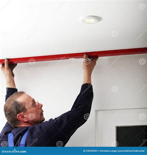 Using a Spirit Level stock photo. Image of renovation - 23639920