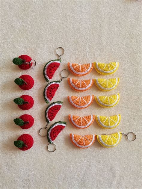 the fruit keychains are made out of crochet