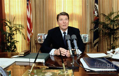 Ronald Reagan In The Oval Office Photograph by Bettmann