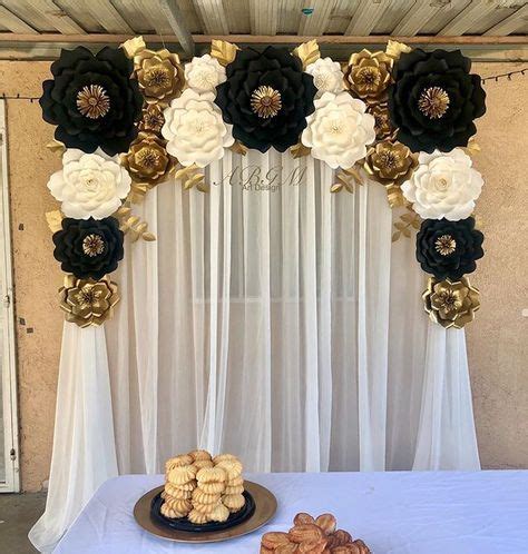 Blanca Ashley on Instagram: "Elegant paper flower backdrop in colors black, white and gold ...