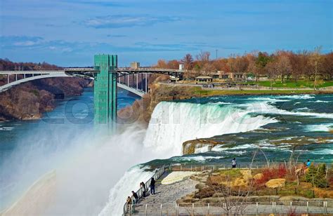 Rainbow in Niagara Falls and Rainbow Bridge over Niagara River | Stock image | Colourbox