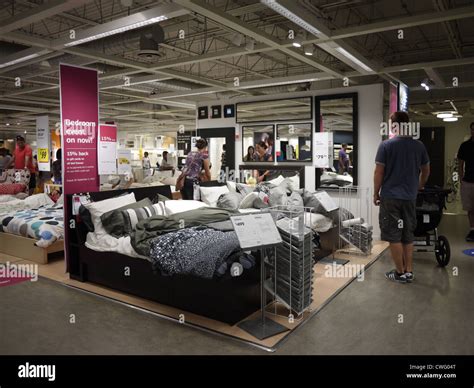 bedroom furniture shopping customers showroom ikea Stock Photo - Alamy