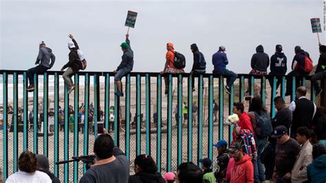 Migrants who traveled with caravan vow to wait at border until they are granted asylum - CNN