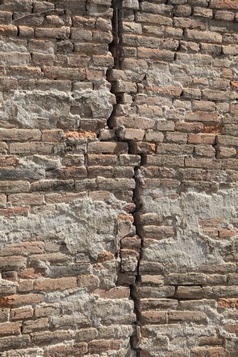 Old brick wall with crack stock photo. Image of color - 157698246