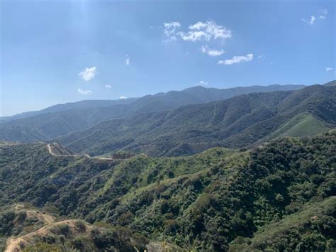 a scenic view of the mountains and roads