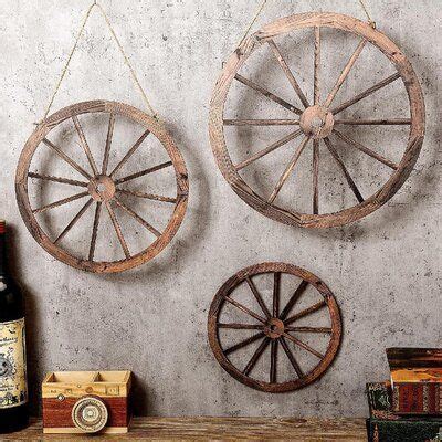 Western Style: these wagon wheel wall decors are designed in the ...