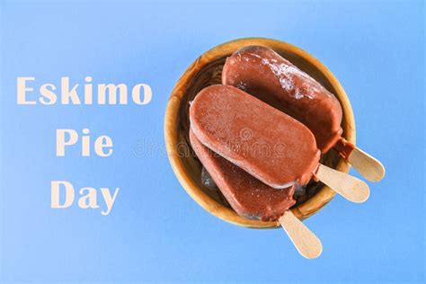 Ice Cream Eskimo Pie on a Stick with Text on a Blue Background. Concept ...