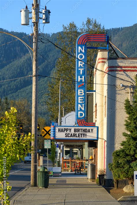 North Bend, WA, USA - October 8, 2023; Sidewalk view of classic North Bend small movie theatre ...