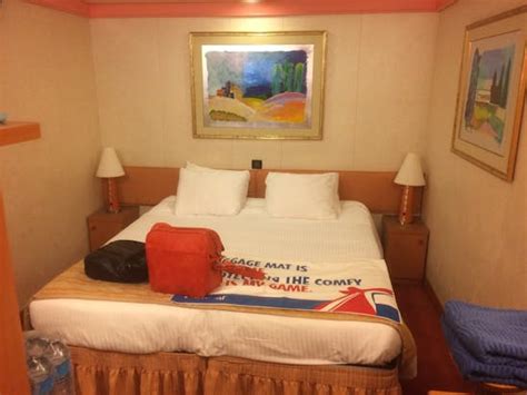 Carnival Conquest Cabins & Staterooms - Cruiseline.com