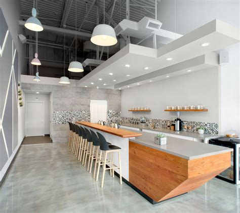 This Modern Coffee Shop Has A Palette Of Grey, White, And Wood ...