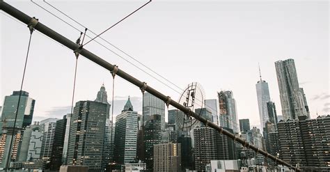 City Skyline Under Gray Sky · Free Stock Photo