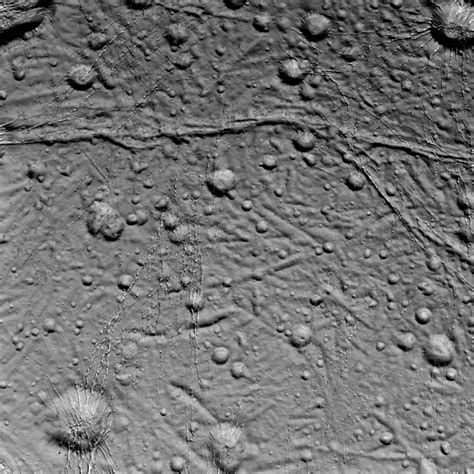 Closeups of Saturn's Moon Enceladus Show Its Bizarre Face