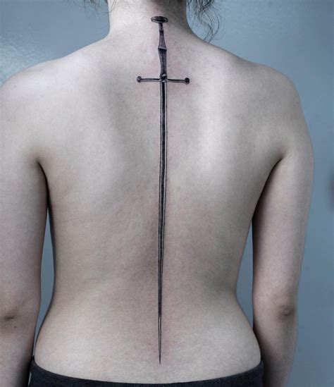 Longsword tattoo over the whole back | Sword tattoo, Sword tattoos for ...